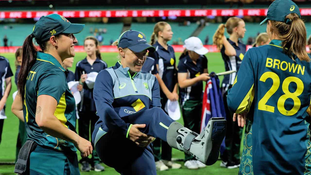 An injured Alyssa Healy of Australia