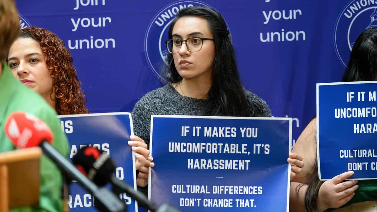 Women protest against workplace sexual harassment. 