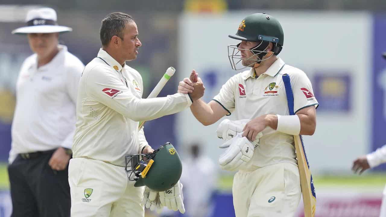 Usman Khawaja (left) and Josh Inglis.