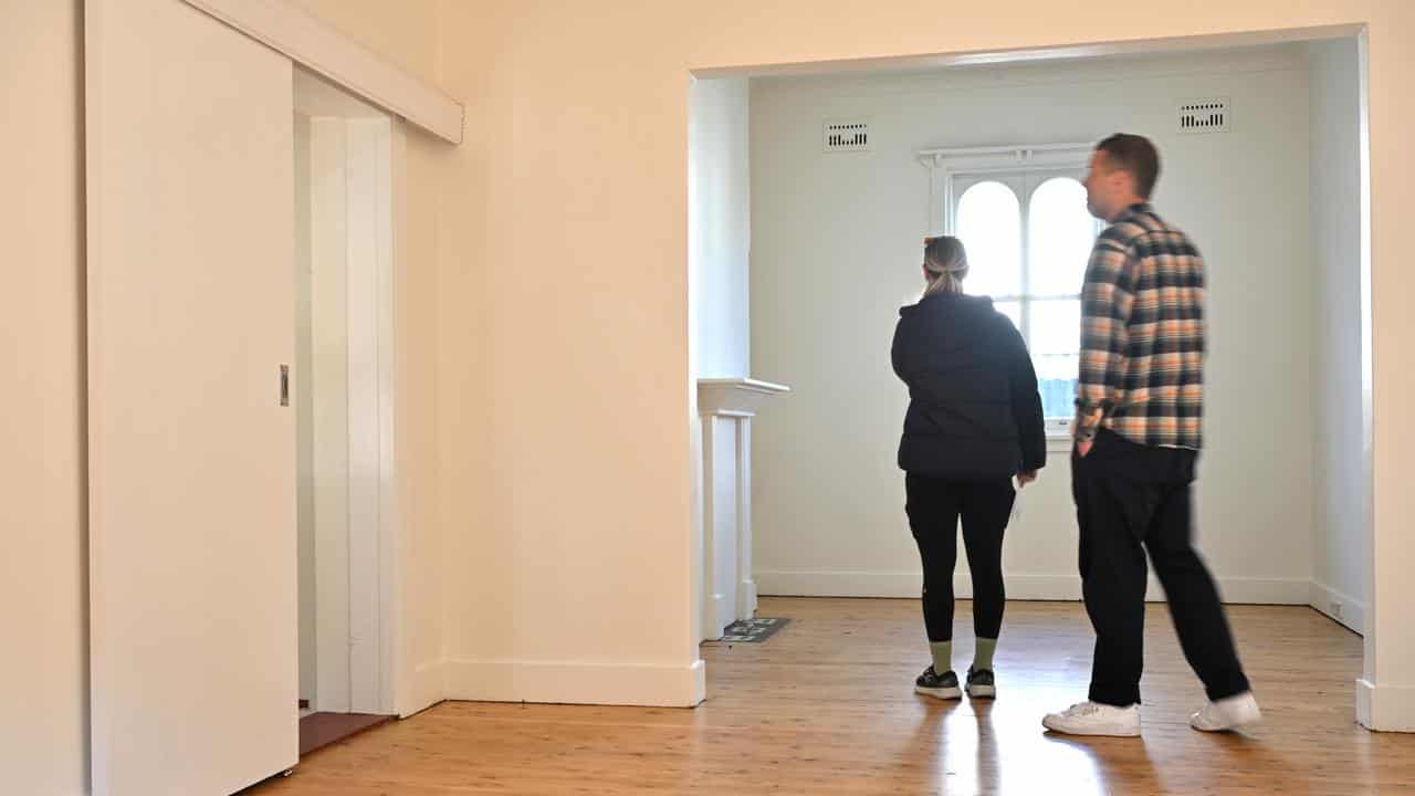 Buyers inspecting a house