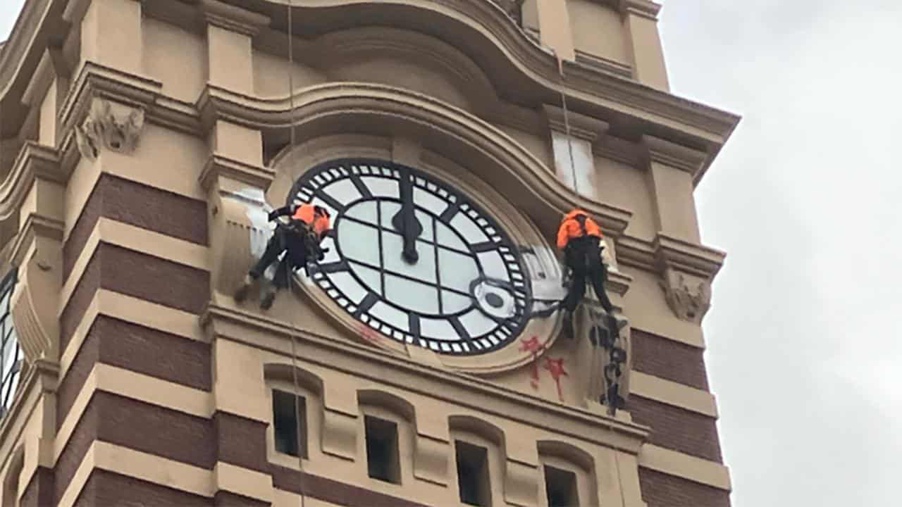 Graffiti on the Flinders Street Station clock tower (file)