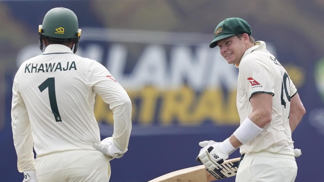Usman Khawaja (left) and Steve Smith.