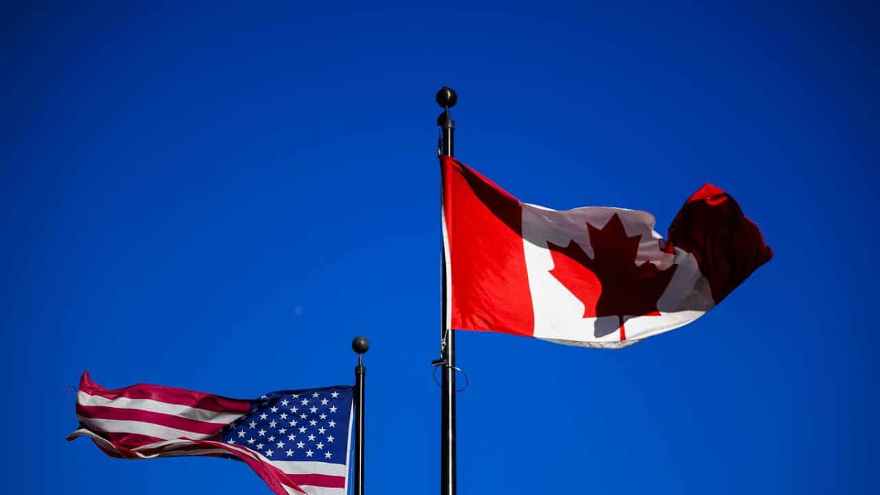 US and Canadian flags