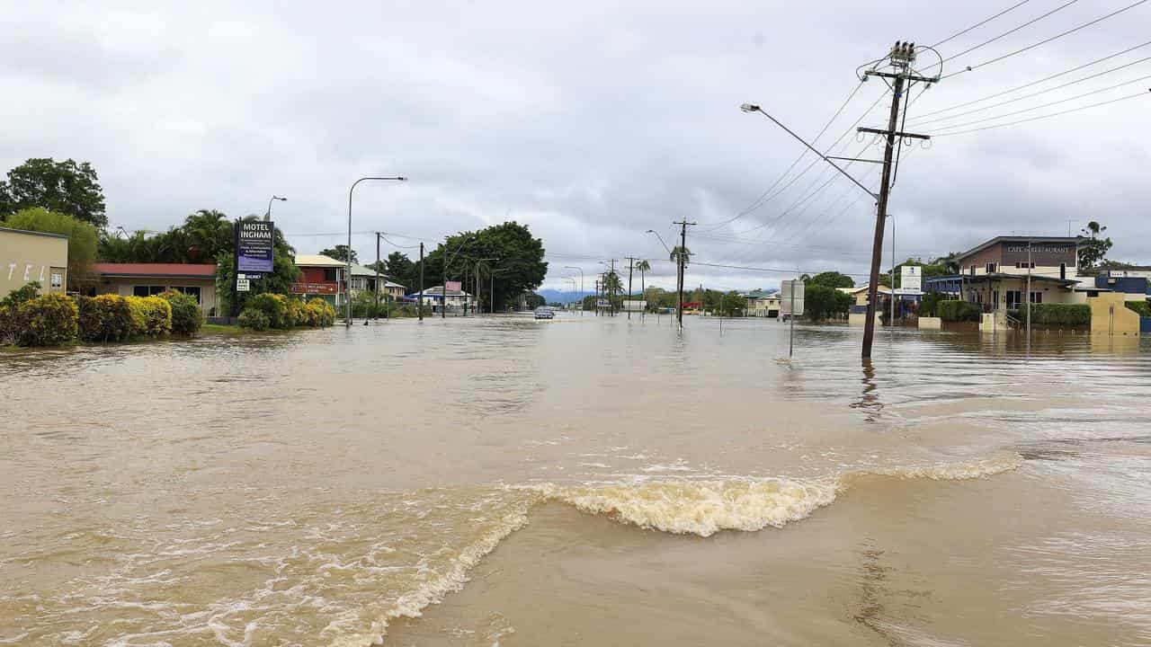 Floodwaters cut off roads, power, and telecommunications in Ingham