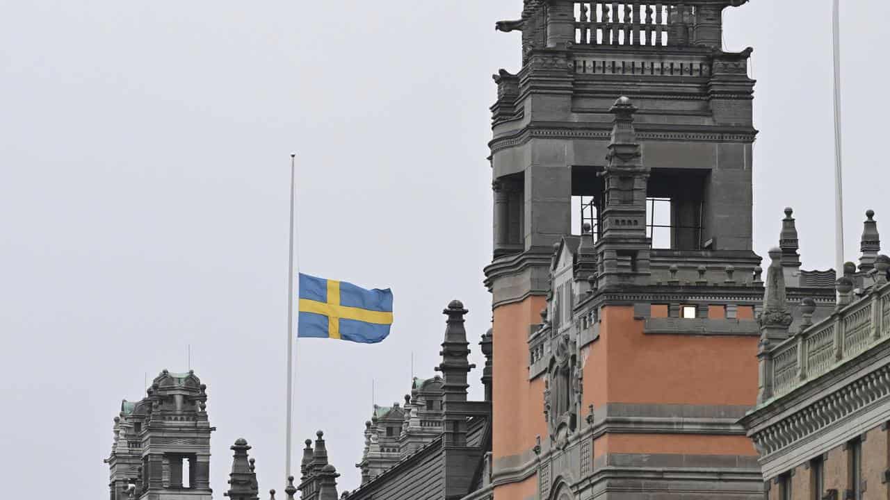 A Swedish flag flies at half-mastin Stockholm