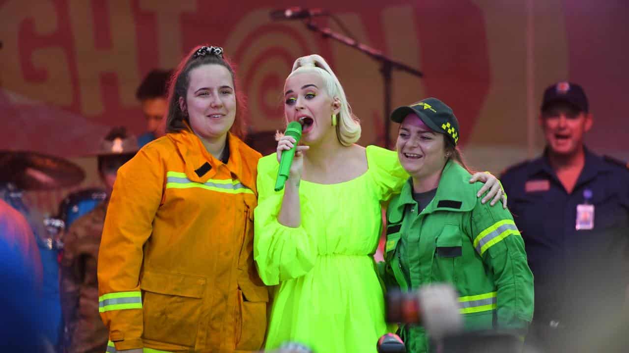 Katy Perry performs with firefighter and forester in Bright in 2020