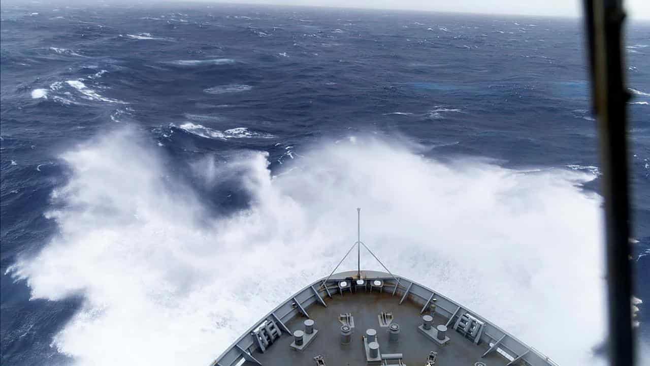 HMAS Choules charts rough seas