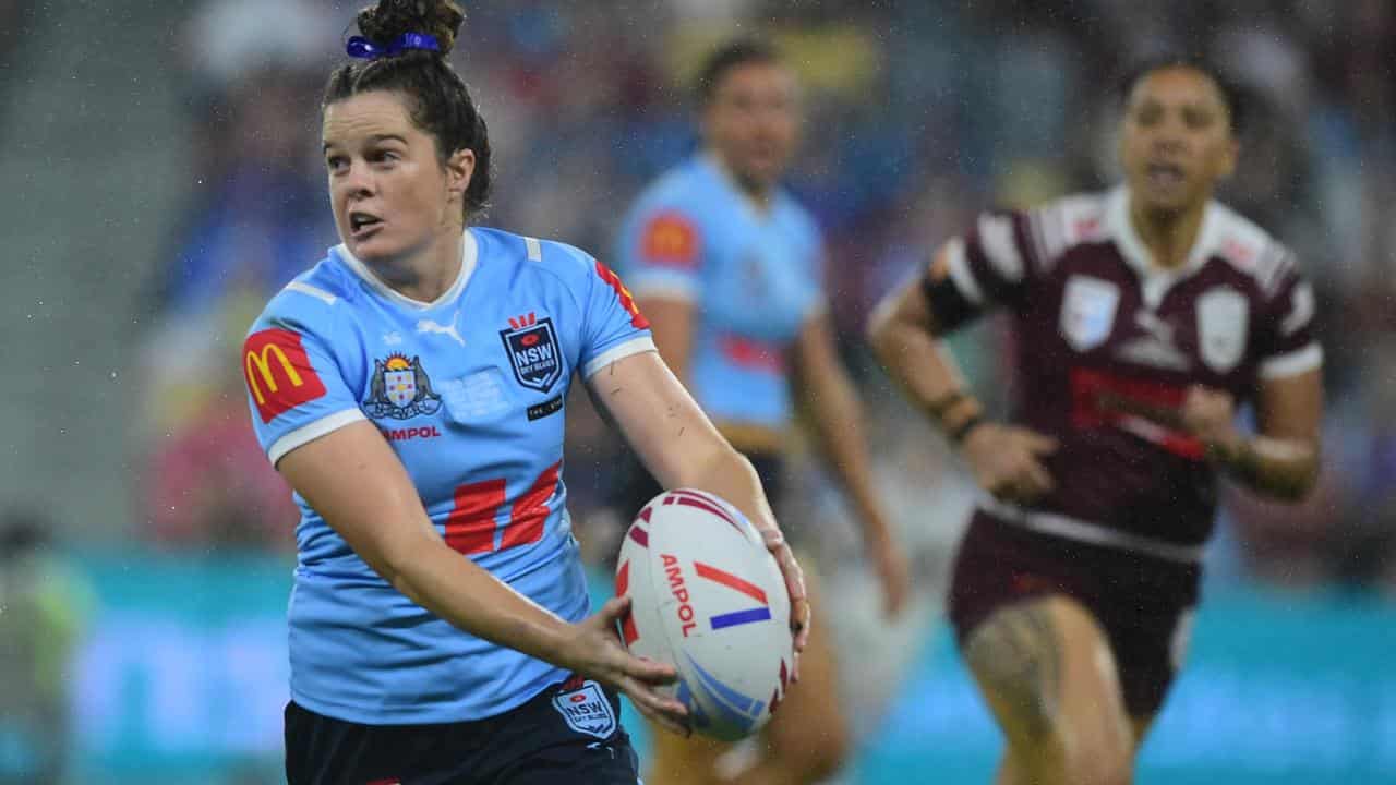 Rachael Pearson on outer of Sky Blues' Origin team