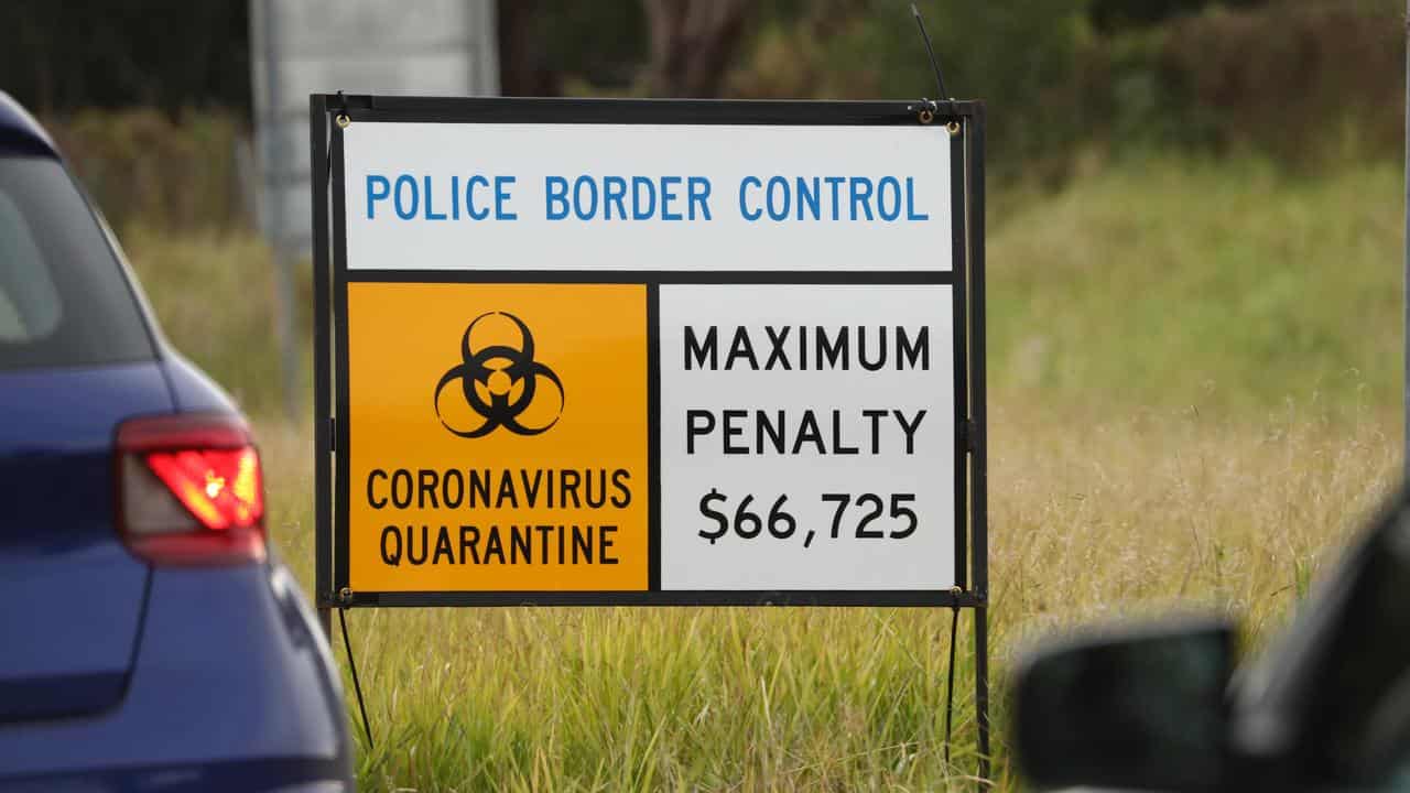 A COVID border closure sign