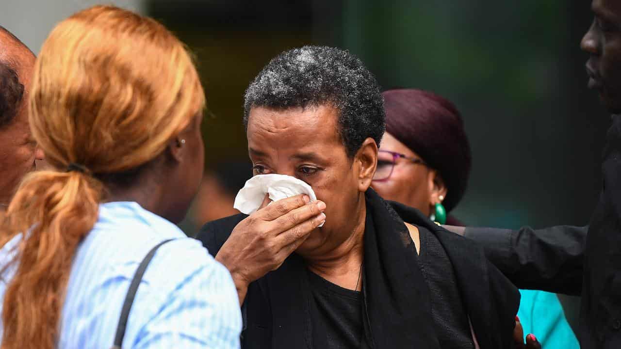 Girum Mekonnen's family members outside court