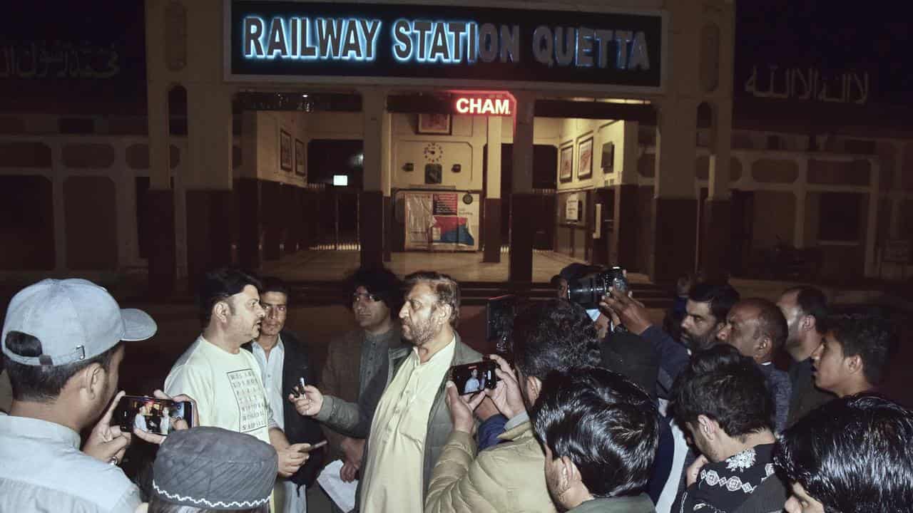 Relatives of hostage at a railway station in Quetta, Pakistan