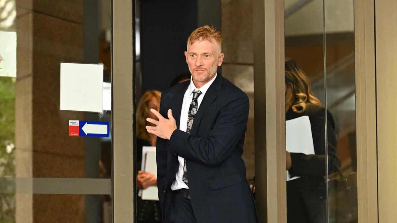 James Latchford (centre) departs from the Melbourne Magistrates Court