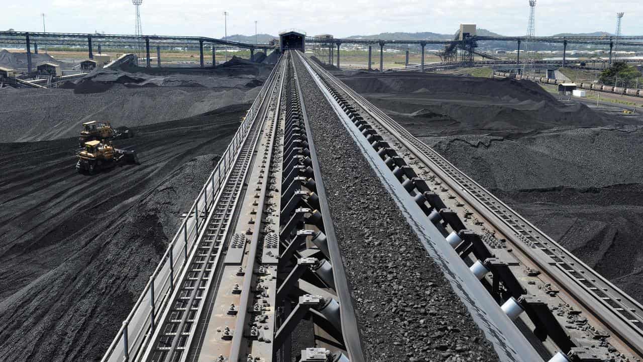 Coal is stockpiled before being loaded on to ships