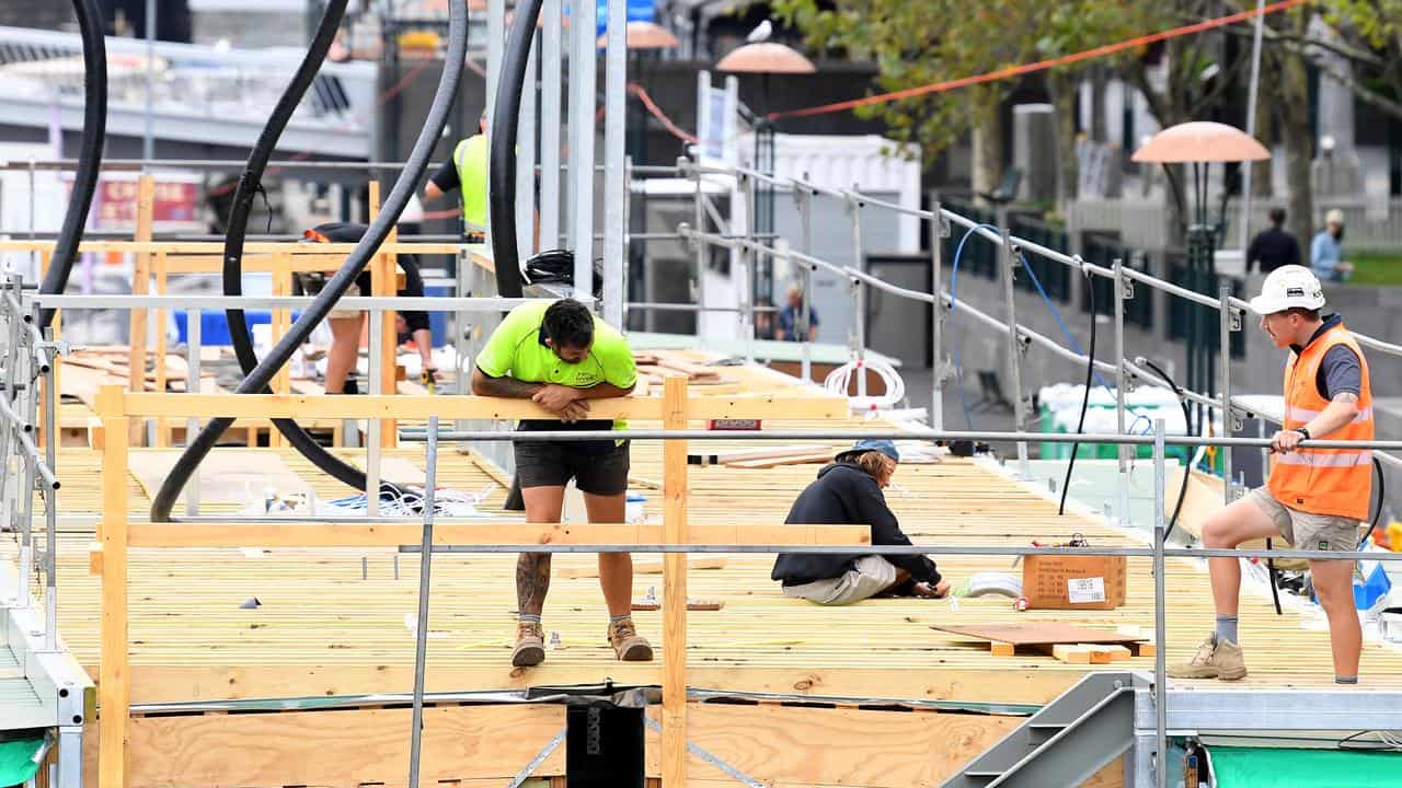 Workers are seen on a construction site