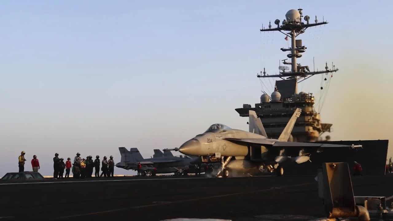 an aircraft launching from Harry S Truman aircraft carrier