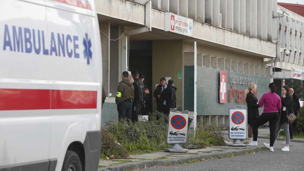 People outside a hospital