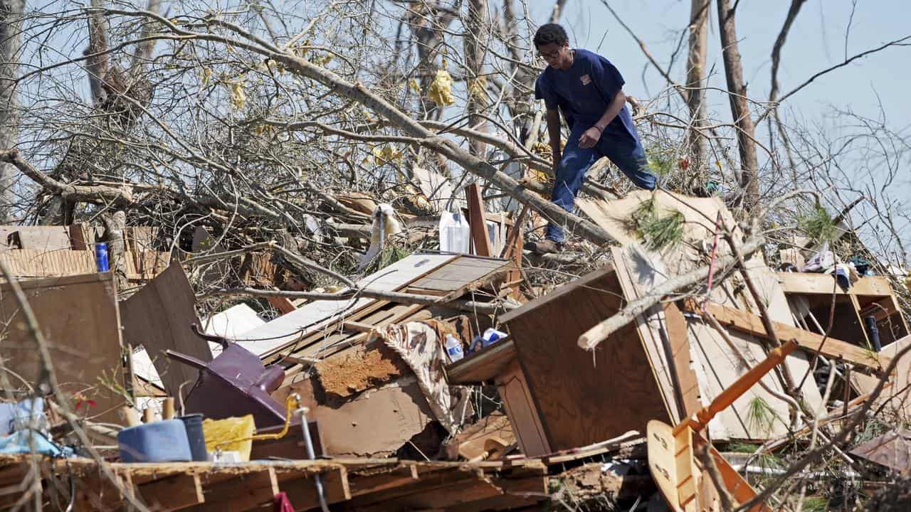 A house destroyed by a tornado in Tylertown, Miss