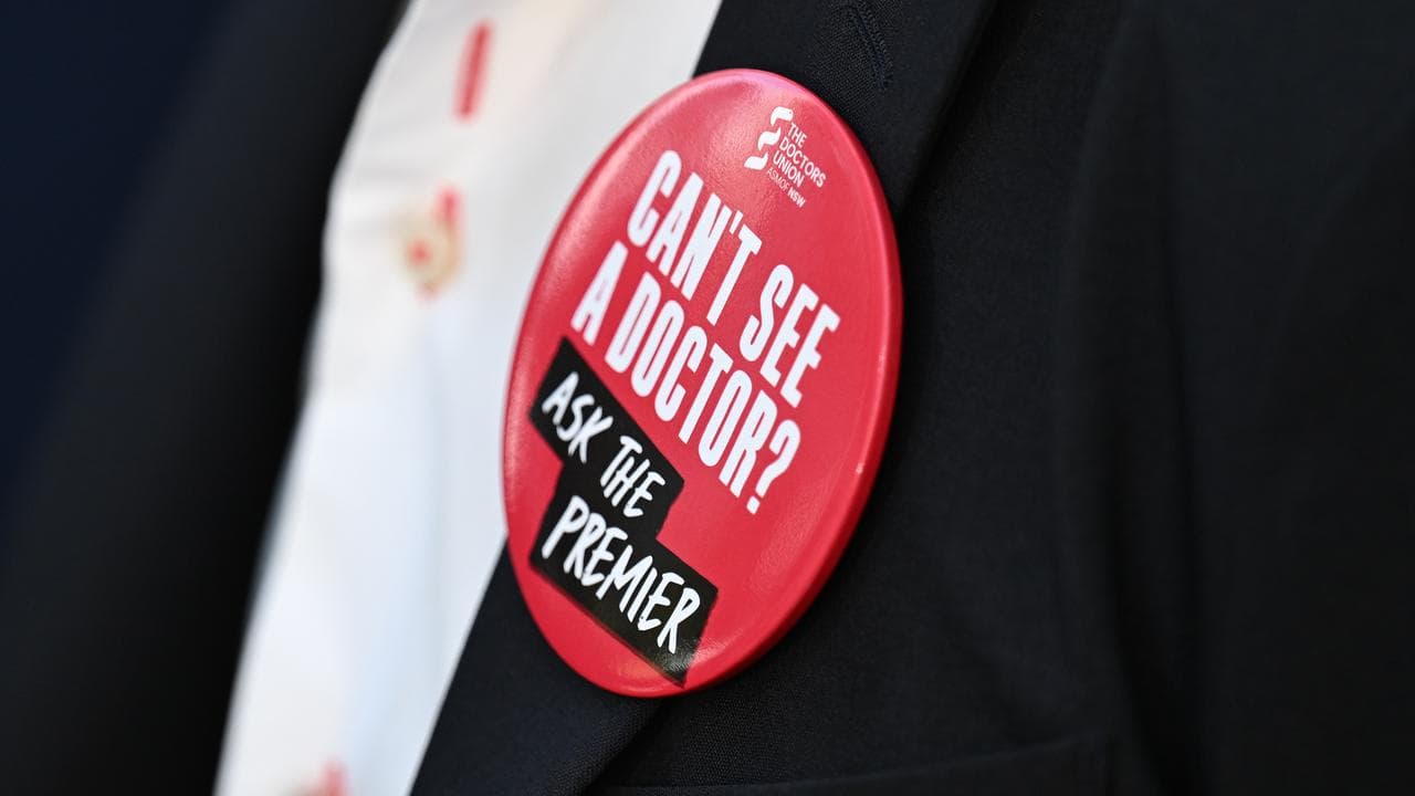 Badges worn by psychiatrists at a rally