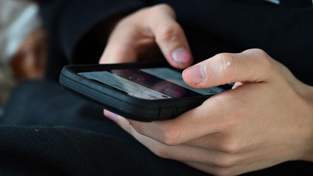 Person uses phone