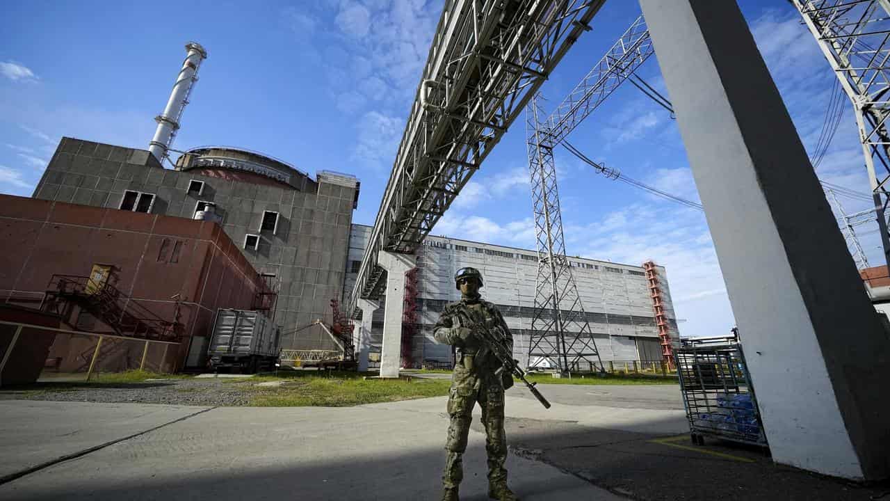 A Russian soldier outside the Zaporizhzhia Power Station (file image)