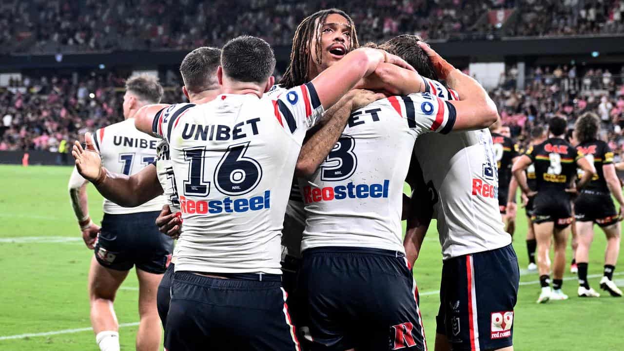 Celebrating Sydney Roosters players.