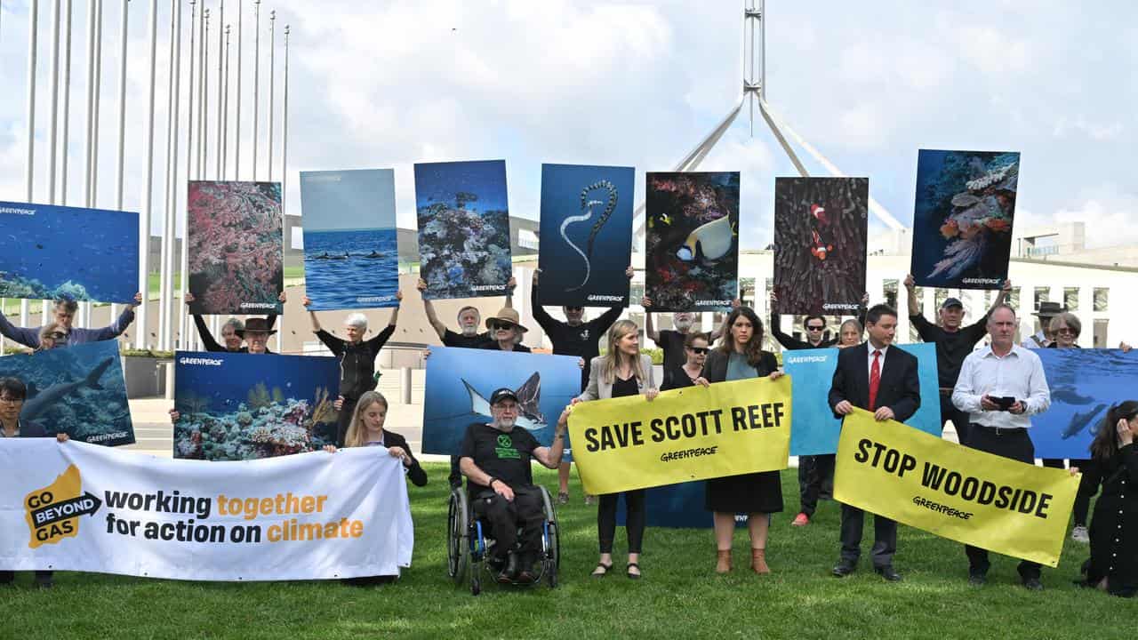 Campaigners protest against Woodside’s proposed gas project.