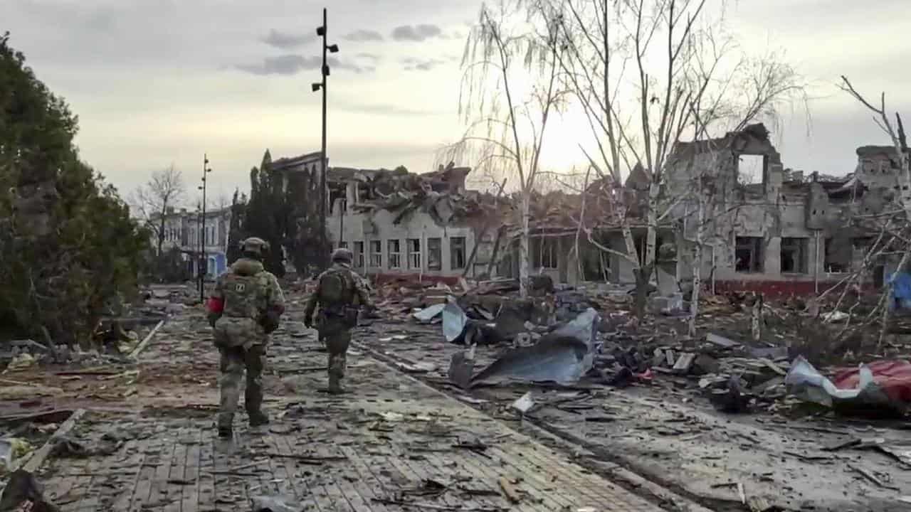 Russian soldiers patrol an area in Sudzha, the Kursk region of Russia