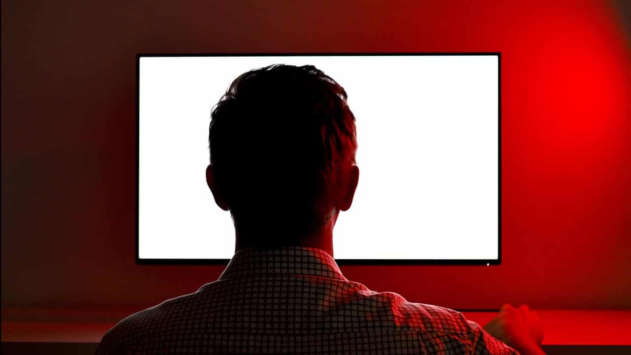 Man looking at screen