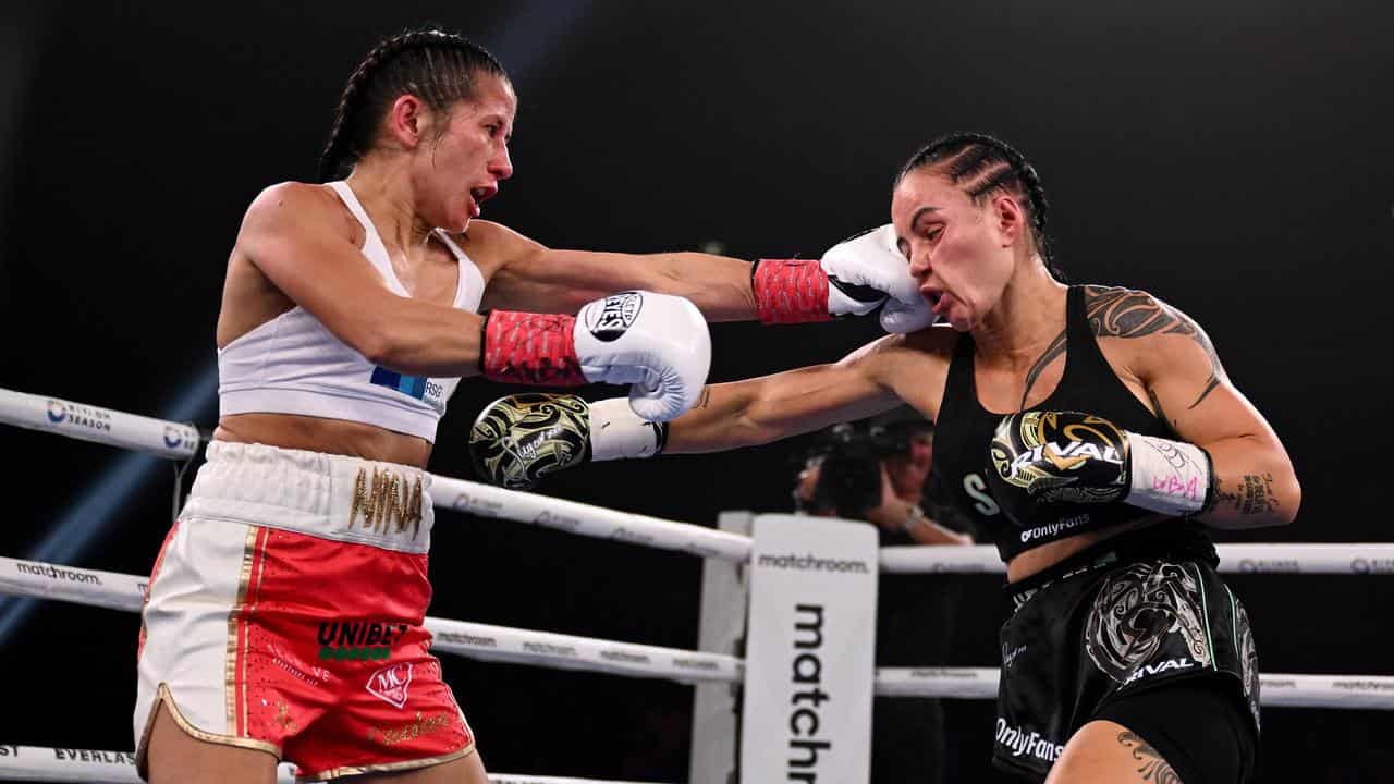 Cherneka Johnson (right) took the fight right up to Nina Hughes