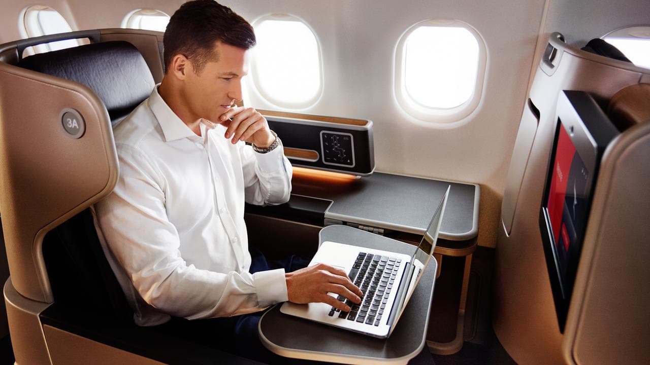 A person in business class on a Qantas flight (file image)