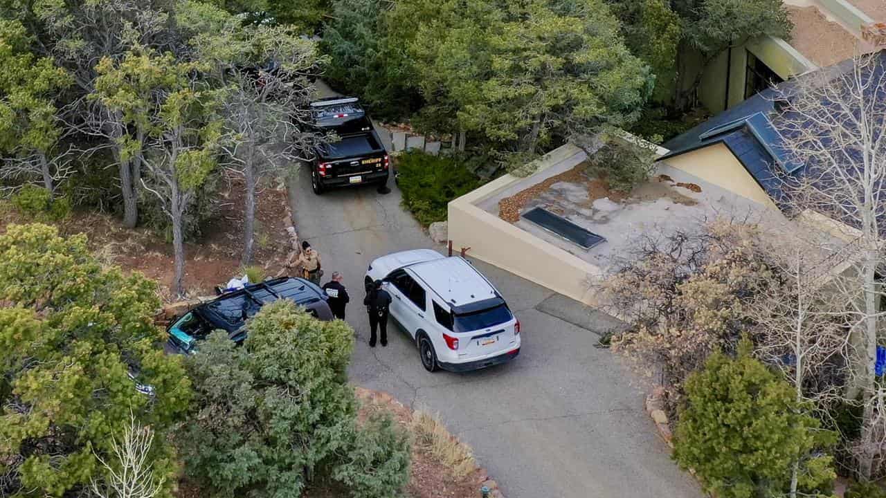 Police at the Hackman home