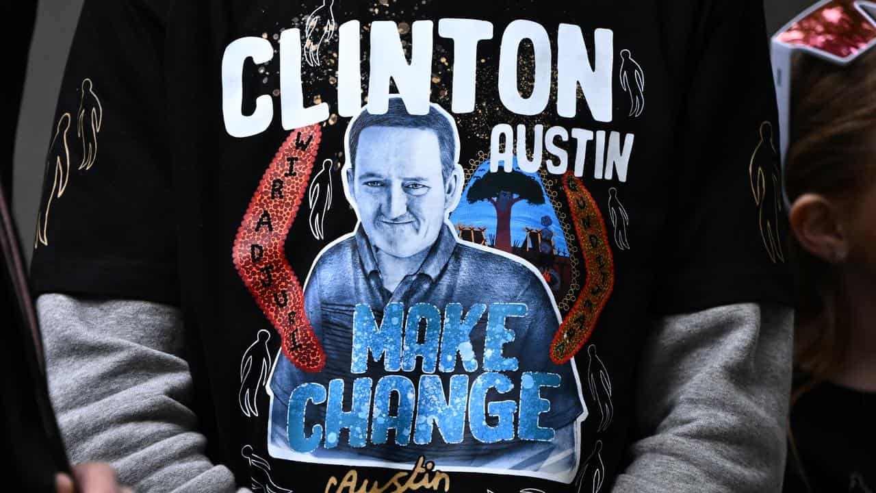 T-shirt showing Clinton Austin (file)