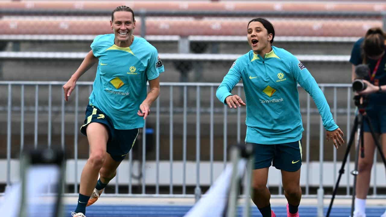 Emily van Egmond and Sam Kerr.