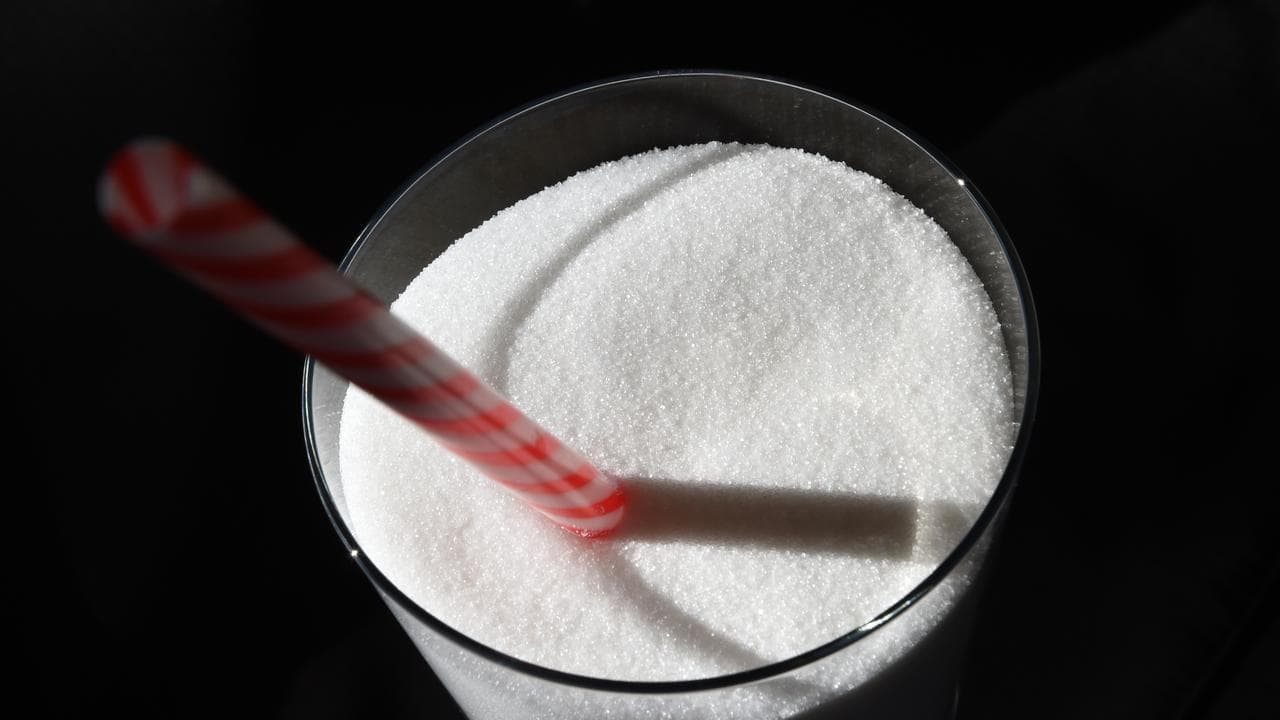 White sugar in a glass