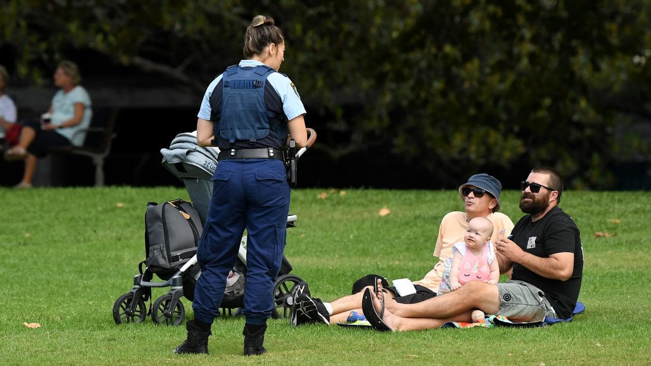 A NSW Police officers talks to people (file image)