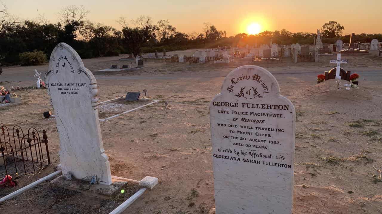 The sun sets over Menindee cemetery