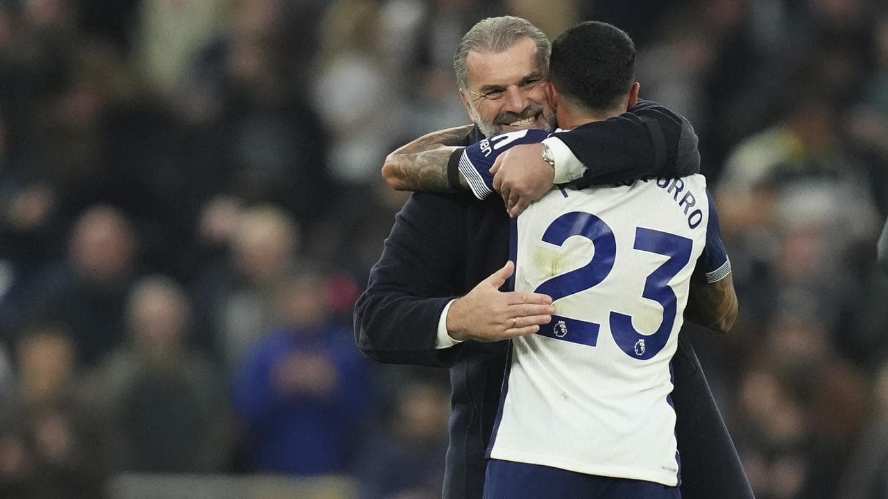 Ange Postecoglou with Pedro Porro