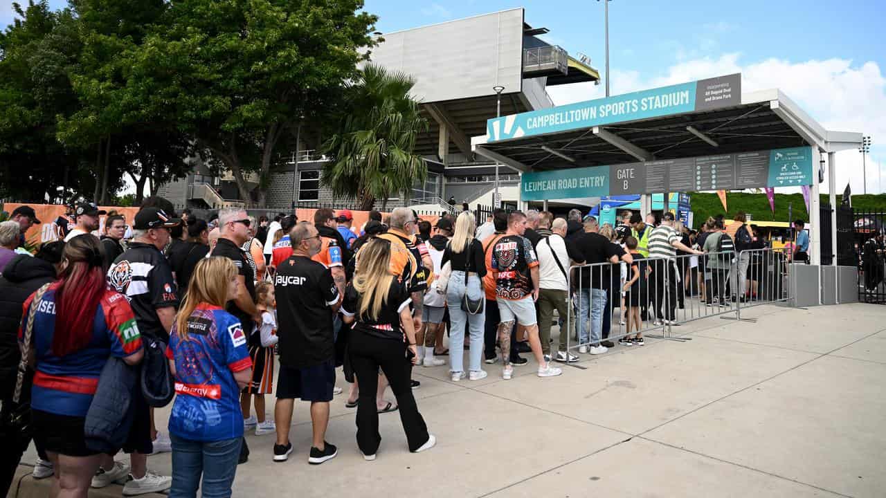 Fans queuing to get into Campbelltown Sports Stadium.