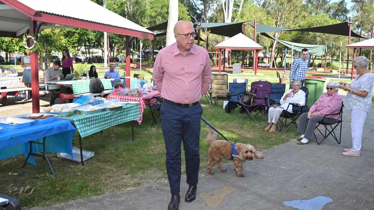Opposition leader Peter Dutton and his pet dog Ralphie.