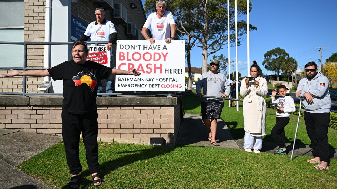 Protesters are seen outside Batemans Bay Urgent Care Clinic