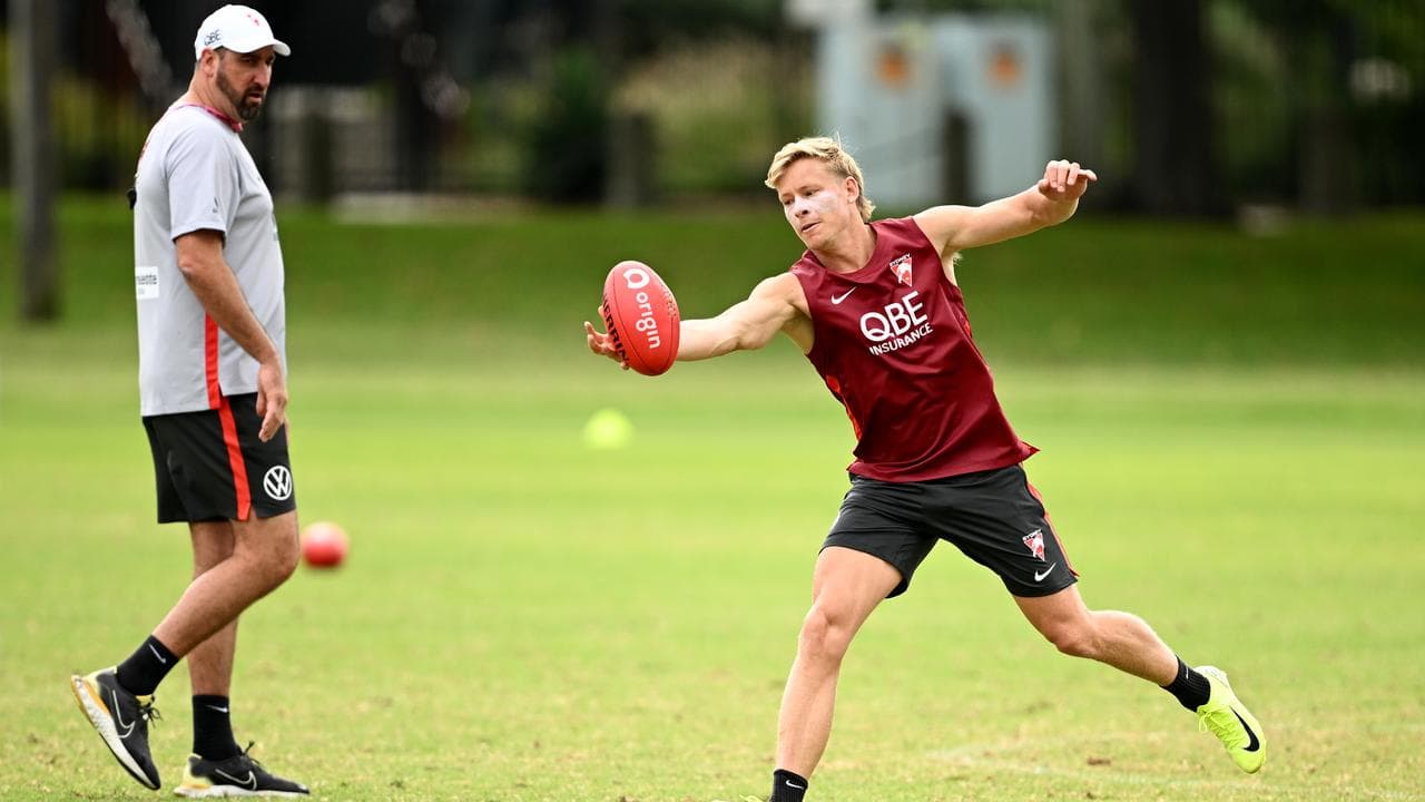 Head coach Dean Cox looks on