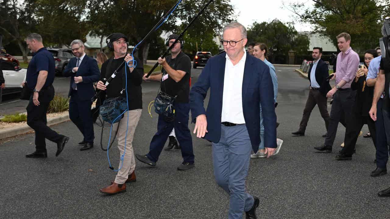 Anthony Albanese outside an early polling place.