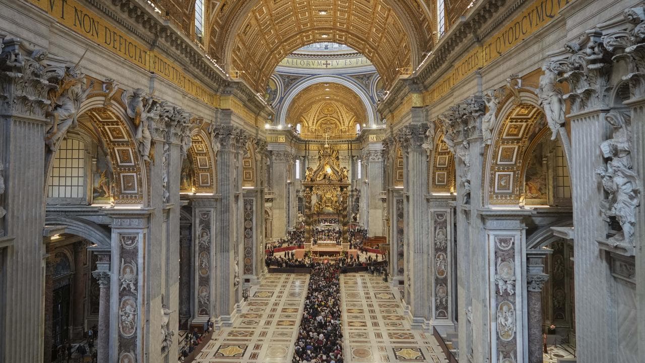 People line up to pay respects to Pope Francis in St Peter's Basilica