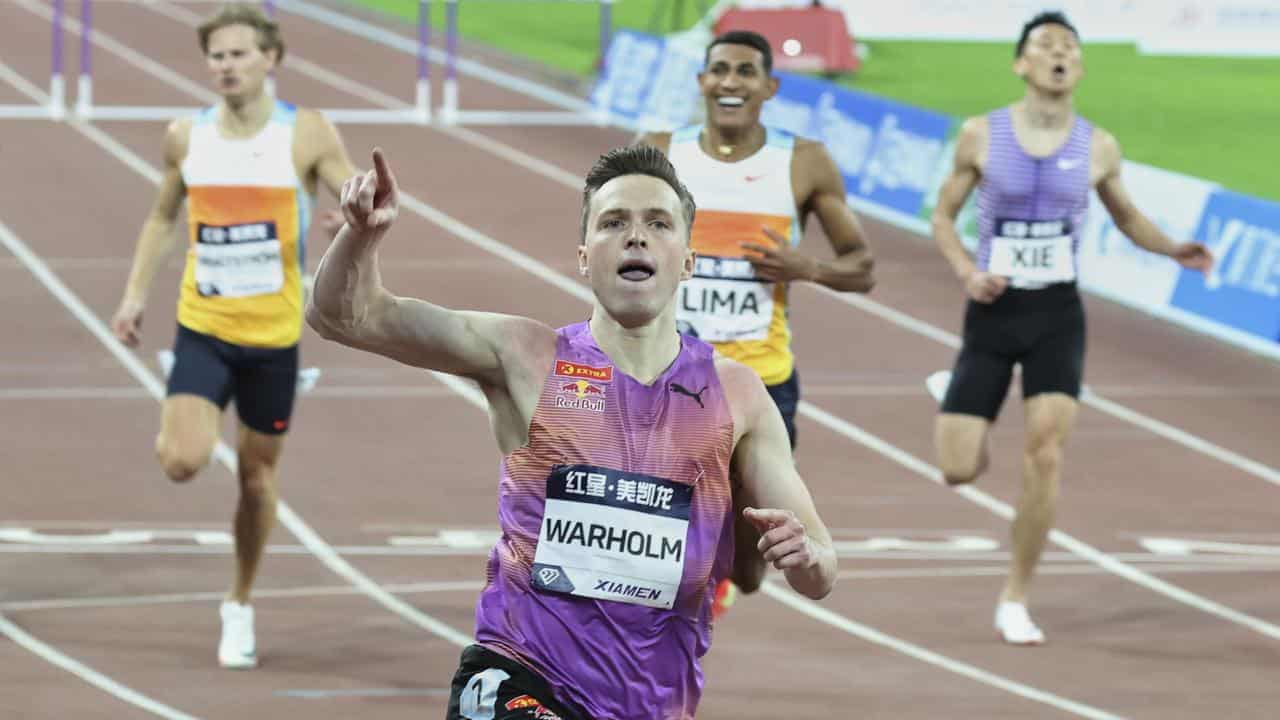 Warholm celebrates