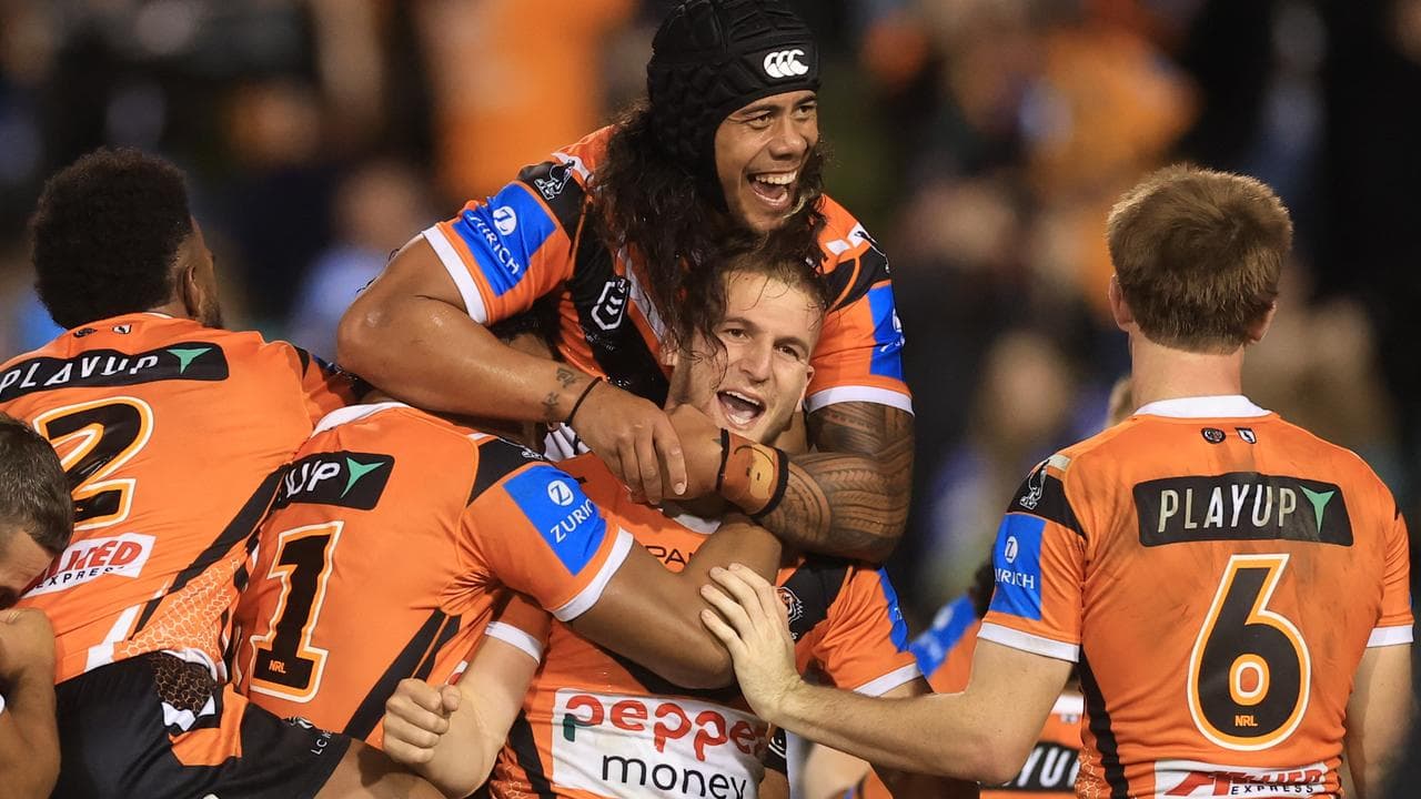 Lachlan Galvin (right) rushes to Adam Douehi.
