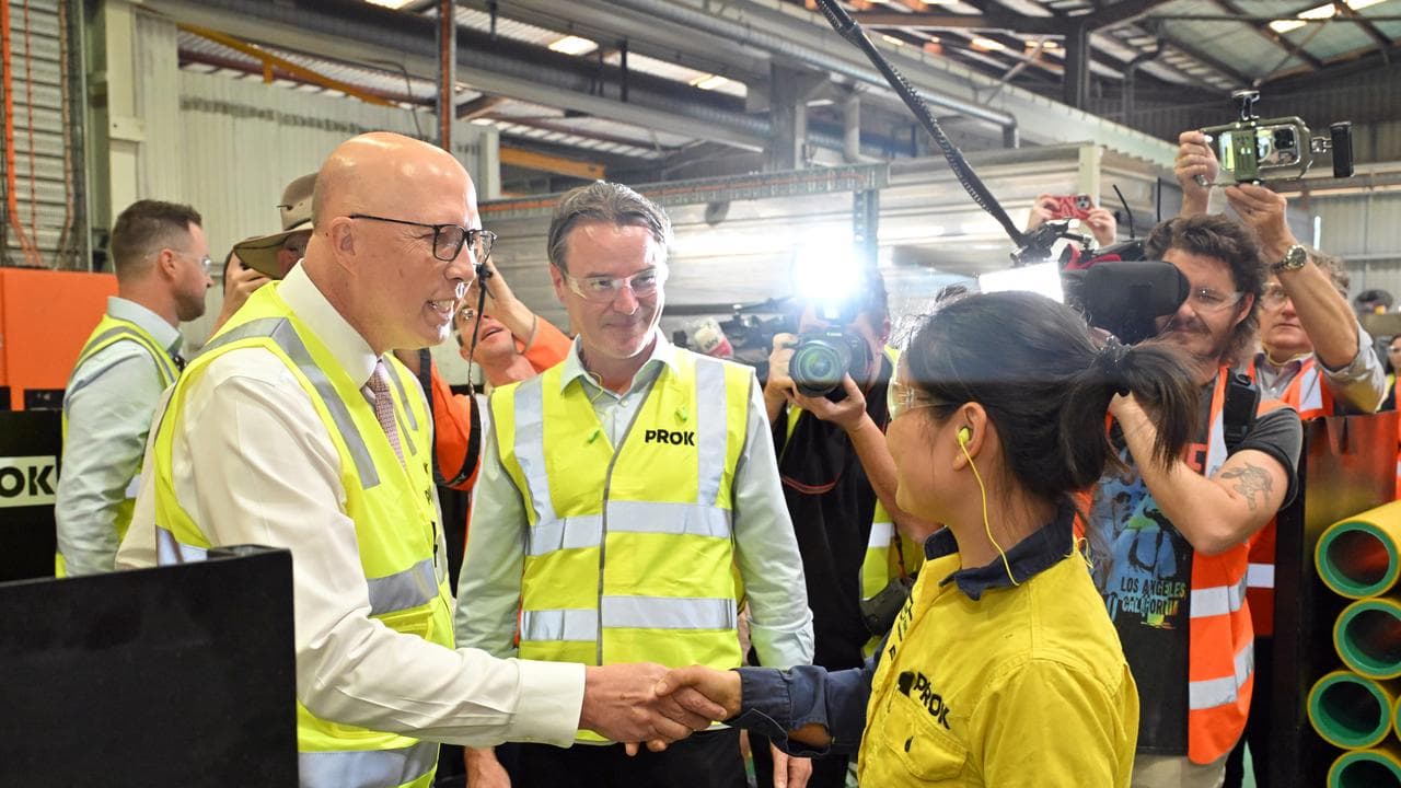 Peter Dutton in high-vis clothing