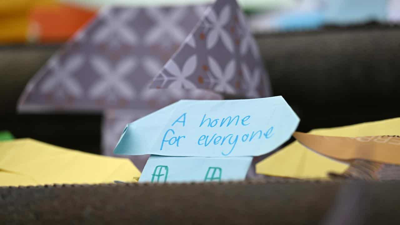 Origami houses in a protest in Melbourne
