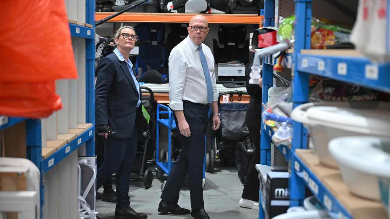 Peter Dutton and wife Kirilly at a women’s support centre in Melbourne