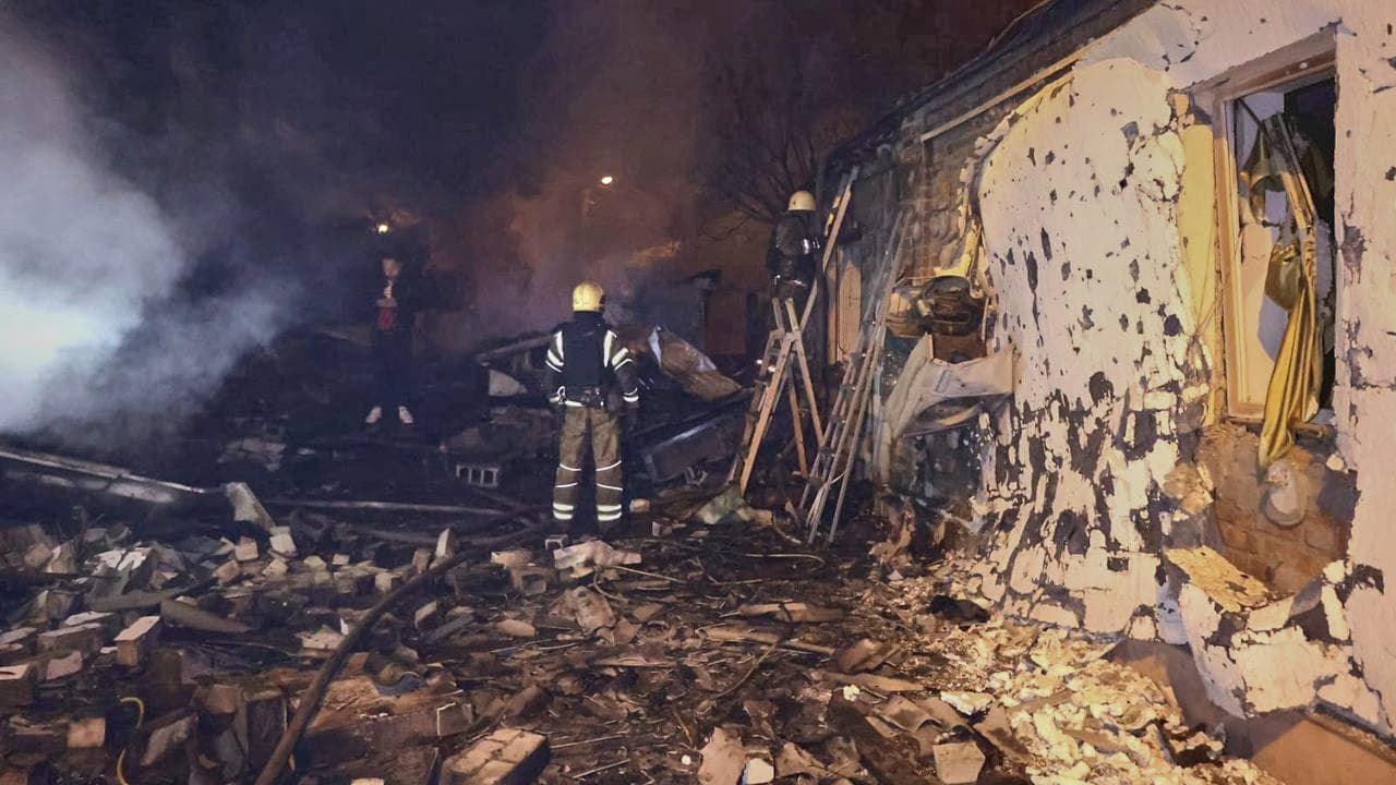 Firefighters fight a fire after a Russian attack in Kharkiv, Ukraine