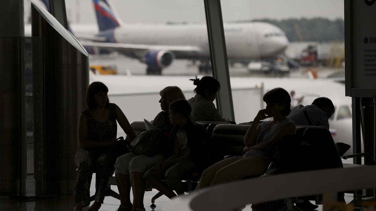 Passengers wait for their flights in Sheremetyevo airport, Moscow